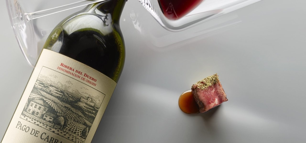 Wine bottle with gourmet food - Wine Paths