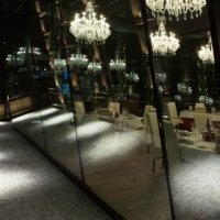 Wine cellar and mirrors at Marqués De Cáceres - Wine Paths
